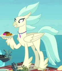 Size: 610x700 | Tagged: safe, derpibooru import, screencap, classical hippogriff, hippogriff, surf and/or turf, beak, bowl, cookie, coral sunburst, cropped, feathered fetlocks, female, female focus, folded wings, food, g4, grin, image, misty shores, morning horizon, offscreen character, outdoors, picnic, plate, png, smiling, solo focus, tail, trio, water, wings