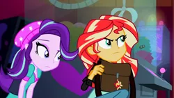 Size: 3072x1727 | Tagged: safe, derpibooru import, screencap, starlight glimmer, sunset shimmer, human, equestria girls, mirror magic, spoiler:eqg specials, beanie, canterlot mall, cinema, clothes, duo, duo female, female, frown, hat, image, jacket, leather, leather jacket, png