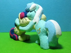 Size: 2275x1706 | Tagged: safe, artist:malte279, derpibooru import, part of a set, bon bon, lyra heartstrings, sweetie drops, earth pony, pony, unicorn, autoclaved aerated concrete, carving, craft, hug, image, irl, jpeg, photo, rotation, sculpture, ytong