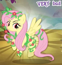 Size: 660x691 | Tagged: safe, derpibooru import, idw, fluttershy, pegasus, pony, bad, cropped, english, female, flower, gameloft, idw showified, image, mare, meme, my little pony: magic princess, png, poison ivyshy, solo, spread wings, text, vine, wings, wow! glimmer