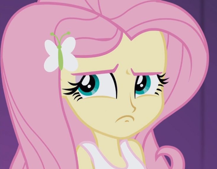 Size: 720x561 | Tagged: safe, derpibooru import, fluttershy, human, equestria girls, clothes, female, image, jpeg, serious, serious face, shirt