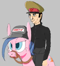 Size: 554x602 | Tagged: safe, anonymous artist, artist:anonymous, oc, ponified, human, pony, admin, black clothes, blue mane, crossgender, cutie mark, determined, determined look, doll (soyjak), female, forklift, forklift certified, gem, hammer and sickle, harness, hat, human riding pony, image, kuz (soyjak), light blue eyes, mare, military hat, old, pink coat, png, simple background, soviet, soyjak, soyjak.party, tack, white background