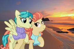 Size: 1280x853 | Tagged: safe, artist:cheezedoodle96, derpibooru import, edit, editor:jaredking779, aunt holiday, auntie lofty, earth pony, pegasus, pony, beach, clothes, duo, female, hoof on chest, image, irl, island, jpeg, mare, photo, ponies in real life, scarf, spread wings, sunset, sweater, wings