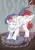 Size: 777x1100 | Tagged: safe, artist:arctic-fox, derpibooru import, oc, oc:swift apex, unofficial characters only, absol, pegasus, pony, clothes, costume, eyes closed, image, jpeg, male, onesie, pegasus oc, pet bed, pokémon, seams, solo, stallion, wings