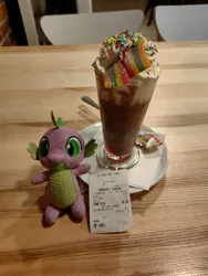 Size: 2736x3648 | Tagged: safe, artist:kuba18i, derpibooru import, spike, dragon, cafe, coffee, food, image, implied rainbow dash, indoors, irl, jpeg, kraków, photo, plushie, poland, polish, receipt, sour jelly, sprinkles, table, whipped cream