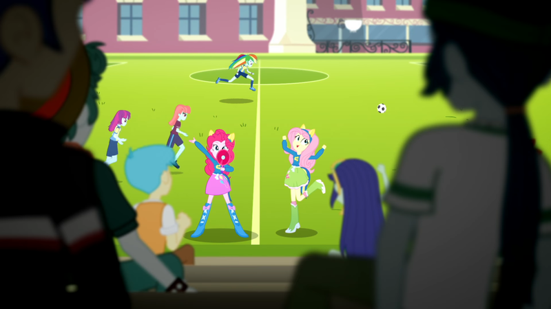 Size: 1920x1080 | Tagged: safe, derpibooru import, screencap, fluttershy, pinkie pie, rainbow dash, equestria girls, arms in the air, boots, clothes, fluttershy's boots, image, megaphone, pinkie pie's boots, png, raised leg, shoes, soccer field, wondercolts, wondercolts uniform
