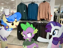 Size: 1032x774 | Tagged: safe, edit, editor:undeadponysoldier, photographer:undeadponysoldier, ponerpics import, ponybooru import, rarity, sapphire shores, spike, dragon, earth pony, pony, unicorn, bag, clothes, edited photo, eyeshadow, happy, hoodie, image, irl, jc penny, jpeg, makeup, male, mall, photo, pointing, ponies in real life, presenting, saddle bag, shopping, shopping mall