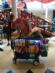 Size: 1536x2048 | Tagged: safe, derpibooru import, pinkie pie, cart, image, irl, jpeg, netherlands, photo, plushie, ponycon holland