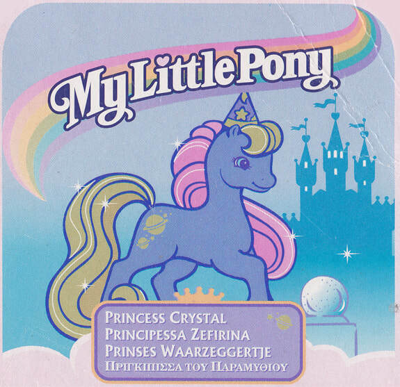 Size: 575x557 | Tagged: safe, derpibooru import, official, princess crystal, earth pony, pony, g2, backcard, castle, cloud, crystal ball, female, hat, image, italian, jpeg, mare, my little pony logo, name, rainbow, raised hoof, smiling, solo, sparkles, text, wizard hat