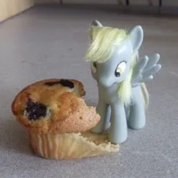 Size: 1920x1922 | Tagged: safe, derpibooru import, derpy hooves, pegasus, pony, eating, food, image, irl, jpeg, muffin, photo, solo, toy