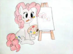 Size: 4032x3016 | Tagged: safe, artist:jakusi, ponerpics import, pinkie pie, earth pony, pony, /bale/, canvas, easel, female, image, jpeg, mare, mouth hold, paint, paint palette, paintbrush, painting, sitting, traditional art