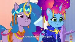 Size: 3072x1727 | Tagged: safe, derpibooru import, screencap, izzy moonbow, pony, unicorn, g5, my little pony: tell your tale, spoiler:g5, spoiler:my little pony: tell your tale, spoiler:tyts02e02, crystal brighthouse, duo, duo female, eyebrows, female, frown, heavy is the mane that wears the fruit crown, image, indonesian, jpeg, mare, misty brightdawn, raised eyebrow, rebirth misty, smiling, subtitles