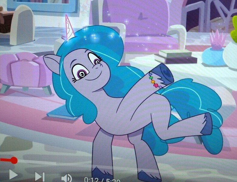 Size: 1935x1488 | Tagged: safe, derpibooru import, screencap, izzy moonbow, pony, unicorn, g5, my little pony: tell your tale, spoiler:g5, spoiler:my little pony: tell your tale, spoiler:tyts01e42, bracelet, couch, crystal brighthouse, cute, dizzy, dizzy izzy, dizzy moonbow, female, firework-ing together, glow, glowing horn, horn, image, izzybetes, jewelry, jpeg, magic, magic glow, mare, photo, picture of a screen, solo, swirly eyes, telekinesis, youtube