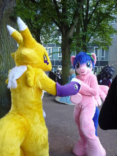 Size: 480x640 | Tagged: safe, artist:atalonthedeer, derpibooru import, firefly, human, g1, 2012, connichi, duo focus, fursuit, image, irl, irl human, jpeg, outdoors, photo, pokémon, ponysuit, solo