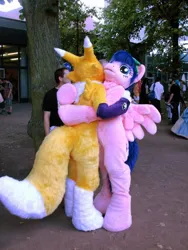 Size: 480x640 | Tagged: safe, artist:atalonthedeer, derpibooru import, firefly, human, g1, 2012, connichi, duo focus, fursuit, image, irl, irl human, jpeg, outdoors, photo, pokémon, ponysuit, solo