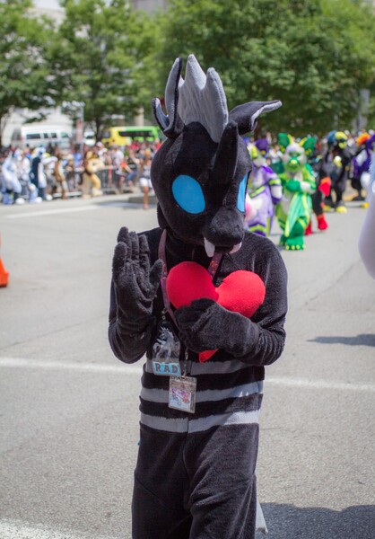 Size: 1115x1600 | Tagged: safe, artist:blue_wolf_studios, derpibooru import, oc, oc:rad, changeling, 2019, anthrocon, changeling oc, clothes, cosplay, costume, furry, fursuit, heart, image, irl, jpeg, outdoors, photo, solo focus