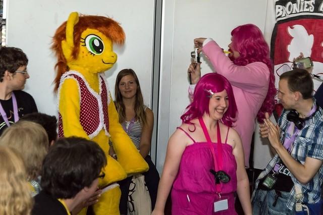 Size: 640x426 | Tagged: safe, artist:atalonthedeer, derpibooru import, oc, oc:canni soda, unofficial characters only, human, 2012, clothes, fursuit, galacon, image, indoors, irl, irl human, jpeg, photo, ponysuit, solo focus