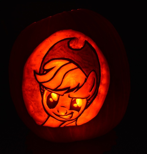 Size: 1470x1546 | Tagged: safe, artist:archiveit1, derpibooru import, applejack, pony, bust, female, glow, halloween, holiday, image, jack-o-lantern, jpeg, mare, portrait, pumpkin, pumpkin carving, smiling, smirk, solo