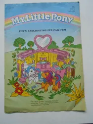 Size: 720x960 | Tagged: safe, derpibooru import, fifi, tex, earth pony, pony, g1, bow, comic cover, cover, cover art, duo, duo male and female, female, flower, hand mirror, image, jpeg, male, mare, my little pony logo, my little pony vol. 1, my little pony vol. 1 #77, neckerchief, official comic, outdoors, photo, tail, tail bow, tree