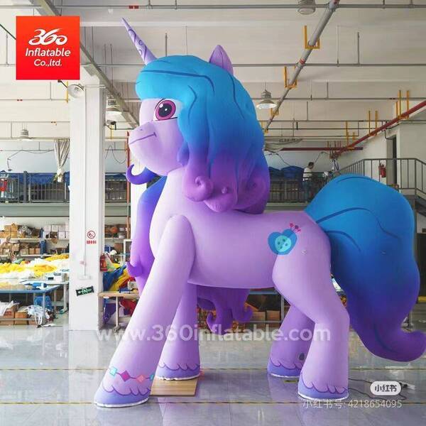 Size: 800x800 | Tagged: safe, derpibooru import, izzy moonbow, human, inflatable pony, pony, unicorn, g5, 360 inflatable, female, horn, image, indoors, inflatable, inflatable unicorn, irl, irl human, izzy is tol, jpeg, logo, mare, matte, photo, shiny floor, side view, solo, standing, watermark