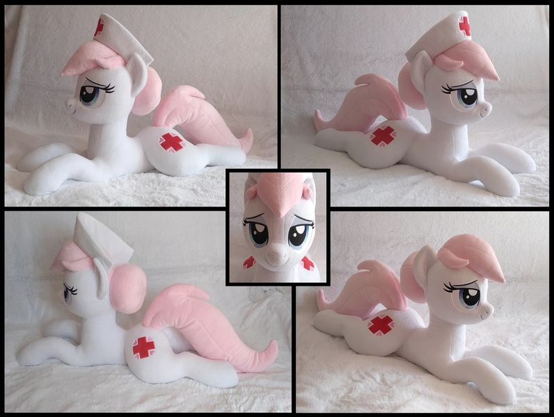 Size: 2198x1654 | Tagged: safe, artist:littlefairyswonders, derpibooru import, nurse redheart, earth pony, pony, g4, bed, bedroom eyes, female, image, irl, jpeg, looking at you, lying down, photo, plushie, solo