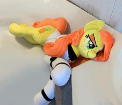 Size: 1733x1490 | Tagged: safe, artist:madi, derpibooru import, oc, oc:anna pine, unofficial characters only, earth pony, pony, clothes, freckles, green eyes, image, jpeg, lying down, orange mane, orange tail, photo, plushie, smug, suit, tail, yellow mane