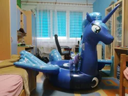 Size: 2000x1500 | Tagged: safe, artist:lorax xyz, artist:loraxxyz, derpibooru import, princess luna, alicorn, inflatable pony, pony, carpet, chair, computer desk, desk, floaty, horseplaytoys, image, indoors, inflatable, inflatable alicorn, inflatable float, irl, jpeg, luna plushie, office chair, photo, plushie, pony plushie, pool toy, window