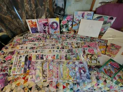 Size: 4160x3120 | Tagged: safe, derpibooru import, idw, apple bloom, applejack, daybreaker, derpy hooves, discord, flam, flim, fluttershy, granny smith, nightmare moon, octavia melody, owlowiscious, pinkie pie, princess cadance, princess celestia, princess luna, rainbow dash, rarity, scootaloo, spike, sweetie belle, twilight sparkle, twilight sparkle (alicorn), vinyl scratch, alicorn, earth pony, pegasus, pony, unicorn, g4, comic, comic book, cutie mark crusaders, element of generosity, element of honesty, element of kindness, element of laughter, element of loyalty, element of magic, elements of harmony, horn, mane six, nightmare night, photo, pinkamena diane pie, power ponies, record, royal guard, student six