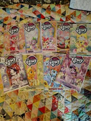 Size: 3072x4080 | Tagged: safe, derpibooru import, idw, apple bloom, applejack, discord, fluttershy, pinkie pie, rainbow dash, rarity, scootaloo, spike, sweetie belle, twilight sparkle, twilight sparkle (alicorn), alicorn, earth pony, pegasus, pony, unicorn, g4, comic book, cutie mark crusaders, horn, image, jpeg, mane six, photo