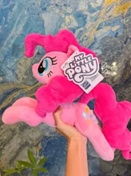 Size: 3355x4474 | Tagged: safe, derpibooru import, official, pinkie pie, original species, plush pony, pony, g4, chinese text, hand, image, irl, jpeg, lying down, merchandise, moon runes, photo, plushie, reesee