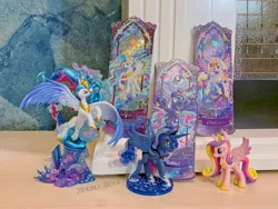 Size: 4380x3285 | Tagged: safe, derpibooru import, kotobukiya, official, princess cadance, princess celestia, princess luna, pony, g4, belly, concave belly, figure, funko, image, irl, jpeg, kayou, large wings, merchandise, music notes, photo, rainbow power, rainbow power-ified, raised hoof, search fun, side view, slender, spread wings, statue, thin, ticket, toy, wings