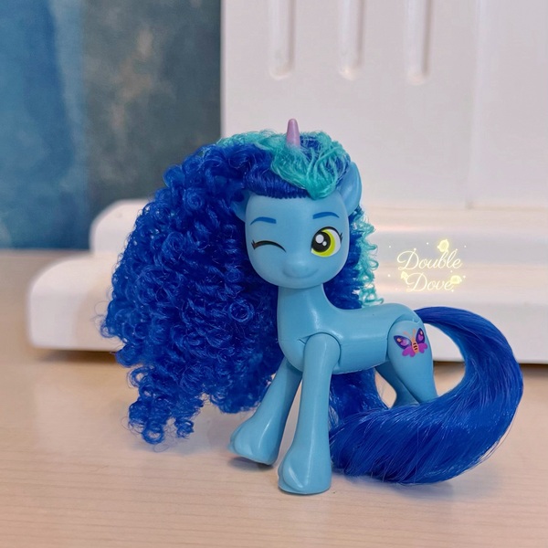 Size: 2252x2252 | Tagged: safe, derpibooru import, official, pony, unicorn, g5, brushable, dinosaw, horn, image, irl, jpeg, long mane, merchandise, misty brightdawn, one eye closed, photo, solo, toy, wink