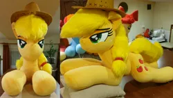 Size: 4032x2268 | Tagged: safe, artist:ponimalion, derpibooru import, applejack, pony, g4, bedroom eyes, female, image, irl, jpeg, lidded eyes, life size, mare, photo, pillow, plushie, smiling, tail