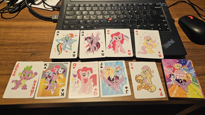 Size: 4000x2252 | Tagged: safe, derpibooru import, official, applejack, fluttershy, pinkie pie, rainbow dash, rarity, spike, twilight sparkle, twilight sparkle (alicorn), alicorn, dragon, earth pony, pegasus, pony, unicorn, g4, ace of clubs, ace of diamonds, ace of hearts, ace of spades, female, flying, horn, image, jpeg, mane six, mare, merchandise, photo, playing card, stock vector