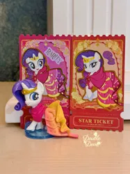 Size: 2750x3667 | Tagged: safe, derpibooru import, official, rarity, pony, unicorn, g4, card, clothes, crown, double dove, dress, ear piercing, earring, figure, gala dress, grand galloping gala, horn, image, irl, jewelry, jpeg, kayou, looking back, merchandise, open mouth, outfit, photo, piercing, regalia, shoes, text, toy