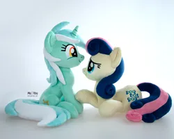 Size: 1600x1279 | Tagged: safe, artist:meplushyou, derpibooru import, bon bon, lyra heartstrings, sweetie drops, earth pony, pony, unicorn, duo, female, image, irl, jpeg, lesbian, looking at each other, looking at someone, lyrabon, photo, plushie, shipping, sitting, smiling