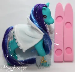 Size: 833x800 | Tagged: safe, derpibooru import, photographer:moonbreeze, earth pony, pony, g2, cape, clothes, comb, female, image, irl, jpeg, mare, photo, skis, snowball (g2), solo, toy