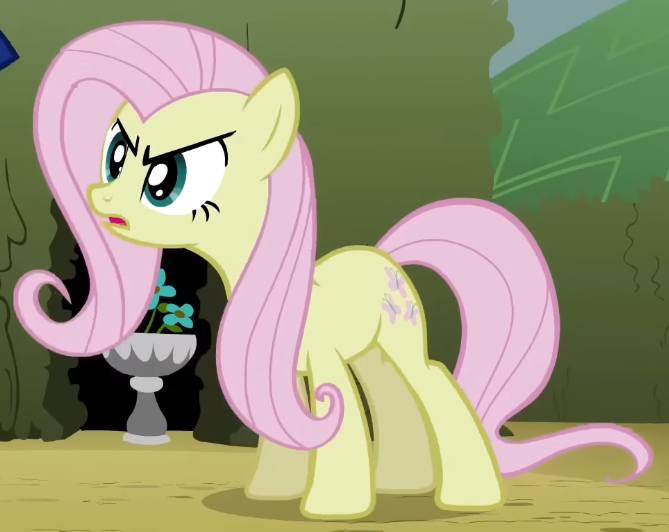 Size: 669x532 | Tagged: safe, derpibooru import, screencap, fluttershy, earth pony, pony, season 2, the return of harmony, annoyed, cropped, discorded, earth pony fluttershy, female, flutterbitch, fluttercruel, frown, g4, glare, image, looking at someone, mare, missing wing, offscreen character, open mouth, png, race swap, solo, standing, wide eyes