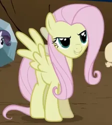 Size: 313x350 | Tagged: safe, derpibooru import, screencap, fluttershy, pegasus, pony, season 2, the return of harmony, cropped, discorded, evil grin, female, flutterbitch, fluttercruel, g4, grin, image, looking at someone, mare, offscreen character, png, smiling, solo focus, spread wings, standing, wings