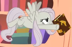 Size: 695x454 | Tagged: safe, derpibooru import, screencap, fluttershy, pegasus, pony, season 2, the return of harmony, book, catching, cropped, discorded, elements of harmony (book), female, flutterbitch, fluttercruel, flying, g4, image, mare, png