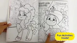 Size: 1280x720 | Tagged: safe, derpibooru import, official, izzy moonbow, unicorn, g5, my little pony: tell your tale, 2d, book, bridlewood, coloring book, coloring page, cute, cutie mark, image, izzybetes, jpeg, looking at you, merchandise, misty brightdawn, mistybetes, page, photo, shy, smiling, smiling at you