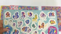 Size: 1280x720 | Tagged: safe, derpibooru import, official, hitch trailblazer, izzy moonbow, pipp petals, sparky sparkeroni, sunny starscout, zipp storm, bird, rabbit, raccoon, seagull, g5, my little pony: tell your tale, 2d, adorapipp, adorazipp, animal, critters, cute, cutie mark, flower, flying, hitchbetes, image, izzybetes, jpeg, looking at you, merchandise, misty brightdawn, mistybetes, one eye closed, photo, raccoonicorn, smiling, smiling at you, sparkybetes, standing, stars, sticker, sticker set, sunnybetes, wink, winking at you