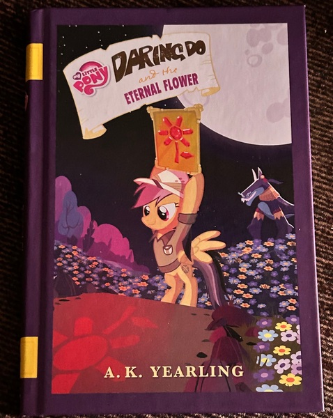 Size: 2365x2970 | Tagged: safe, derpibooru import, ahuizotl, daring do, ahuizotl (species), pegasus, daring do adventure collection, daring do and the eternal flower, book, eternal flower, image, irl, jpeg, photo