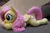 Size: 5074x3383 | Tagged: safe, artist:azgchip, derpibooru import, fluttershy, pegasus, pony, cute, female, g4, image, irl, life size, lying down, mare, photo, plushie, png, prone, shyabetes, solo, sploot