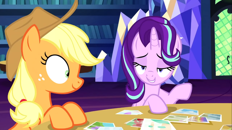 Size: 1394x783 | Tagged: safe, derpibooru import, screencap, applejack, starlight glimmer, pony, every little thing she does, duo, female, image, library, lidded eyes, mare, photos, png, shrunken pupils, table, twilight's castle, twilight's castle library