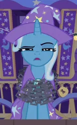 Size: 225x365 | Tagged: safe, derpibooru import, screencap, trixie, uncommon bond, cape, chains, clothes, cropped, hat, image, lock, png, solo, trixie's cape, trixie's hat