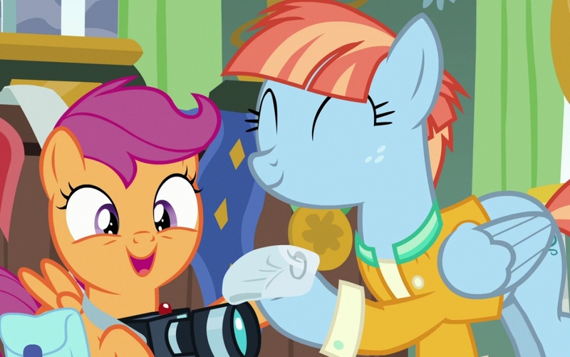 Size: 1024x641 | Tagged: safe, derpibooru import, edit, edited screencap, screencap, scootaloo, windy whistles, pegasus, pony, parental glideance, ^^, bag, camera, clothes, cropped, cute, cutealoo, diaper, duo, eyes closed, female, filly, foal, freckles, holding, image, jacket, jpeg, looking at each other, looking at someone, mare, open mouth, open smile, saddle bag, scootalove, smiling, smiling at each other, spread wings, windybetes, wings