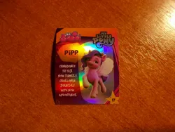 Size: 1024x768 | Tagged: safe, derpibooru import, official, pipp petals, pegasus, g5, my little pony: a new generation, image, indonesian, info, jpeg, looking at you, merchandise, photo, profile, shiny, smiling, smiling at you, standing, stars, sticker