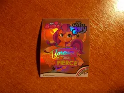 Size: 1024x768 | Tagged: safe, derpibooru import, official, sunny starscout, earth pony, g5, 2d, horseshoes, image, indonesian, jpeg, looking away, merchandise, photo, shiny, slogan, smiling, sticker