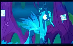 Size: 4000x2514 | Tagged: safe, derpibooru import, fluttershy, queen chrysalis, rainbow dash, changeling, changeling queen, the mean 6, everfree forest, female, g4, image, jpeg, low quality, open mouth, photo, picture of a screen, solo focus, spread wings, television, wings